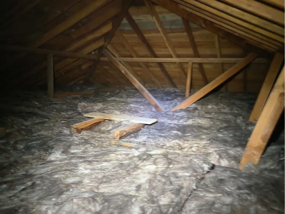 Ceiling space with new insulation laid between joists